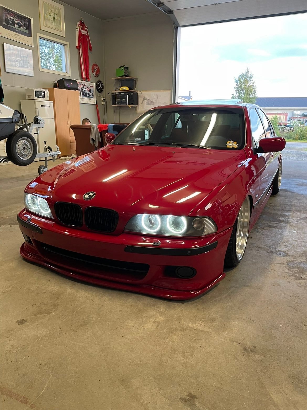 Lowered red BMW 5 Series E39 with angel-eye headlights – Wicked Street Customs